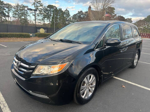 2015 Honda Odyssey for sale at Phoenix Motor Sales in Snellville GA