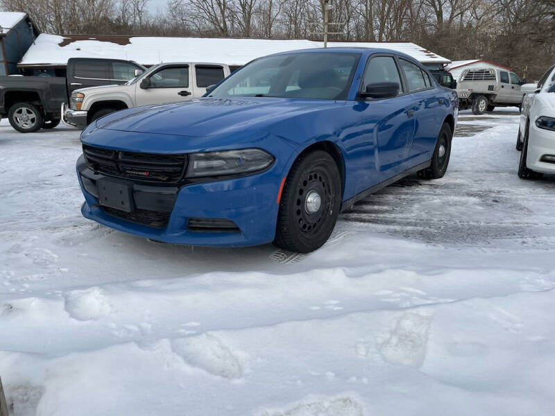 2015 Dodge Charger for sale at Rombaugh's Auto Sales in Battle Creek MI
