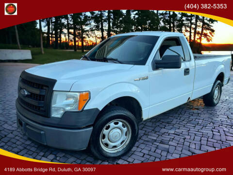 2013 Ford F-150 for sale at Carma Auto Group in Duluth GA