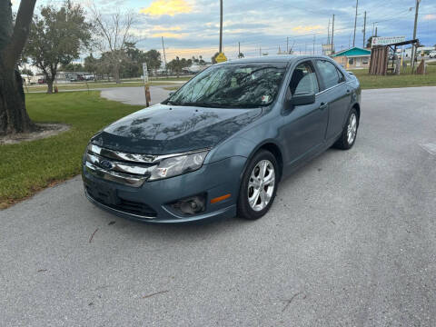 2012 Ford Fusion for sale at LLAPI MOTORS in Hudson FL