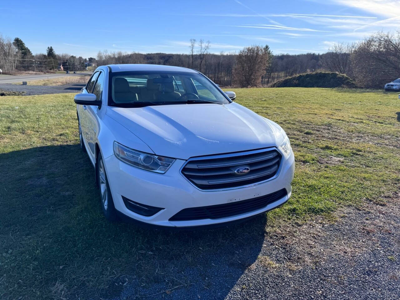 2013 Ford Taurus for sale at Riverside Motors in Glenfield, NY