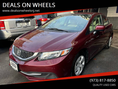 2015 Honda Civic for sale at DEALS ON WHEELS in Newark NJ