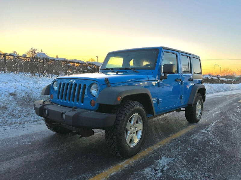 2011 Jeep Wrangler Unlimited for sale at Auto Tech Car Sales in Saint Paul MN