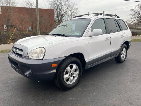 2006 Hyundai Santa Fe for sale at GLASS CITY AUTO CENTER in Lancaster OH