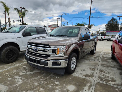 2018 Ford F-150 for sale at E and M Auto Sales in Bloomington CA