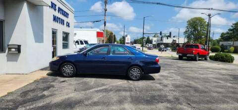 2006 Toyota Camry for sale at VINE STREET MOTOR CO in Urbana IL