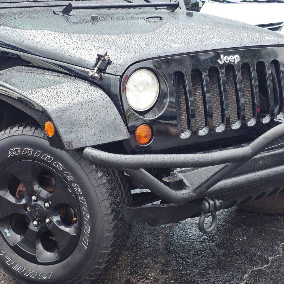 2011 Jeep Wrangler Unlimited for sale at SouthMotor Miami in Hialeah, FL