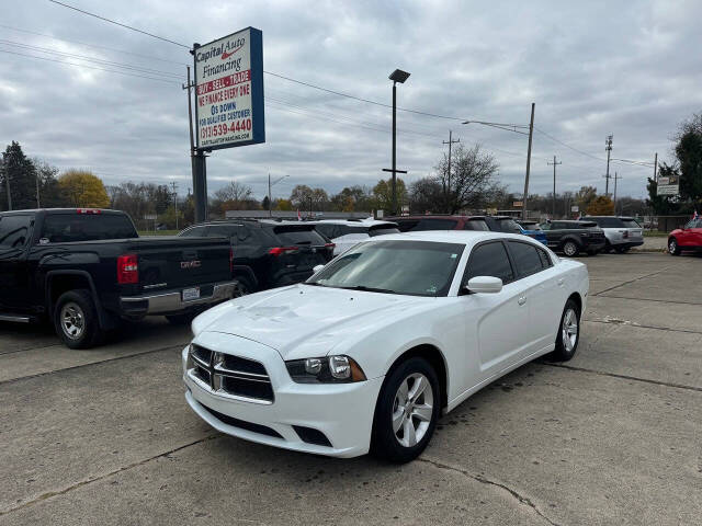 2014 Dodge Charger for sale at Capital Auto Financing in Redford, MI