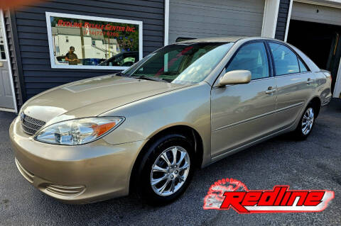 2003 Toyota Camry for sale at Redline Resale Center Inc in Lockport NY