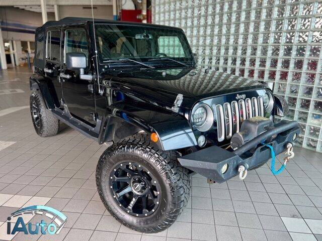 2016 Jeep Wrangler Unlimited for sale at iAuto in Cincinnati OH