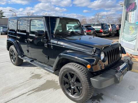 2014 Jeep Wrangler Unlimited for sale at River Motors in Portage WI