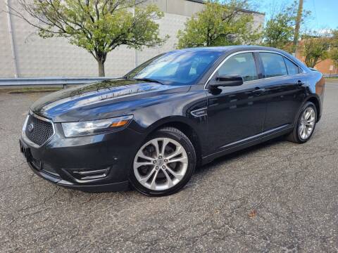 2014 Ford Taurus for sale at Positive Auto Sales, LLC in Hasbrouck Heights NJ