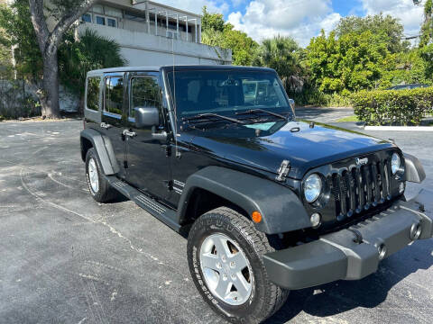 2016 Jeep Wrangler Unlimited for sale at MITCHELL MOTOR CARS in Fort Lauderdale FL