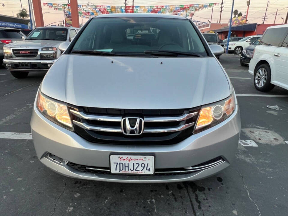 2014 Honda Odyssey for sale at Unique Auto Sales, Inc. in Bell, CA