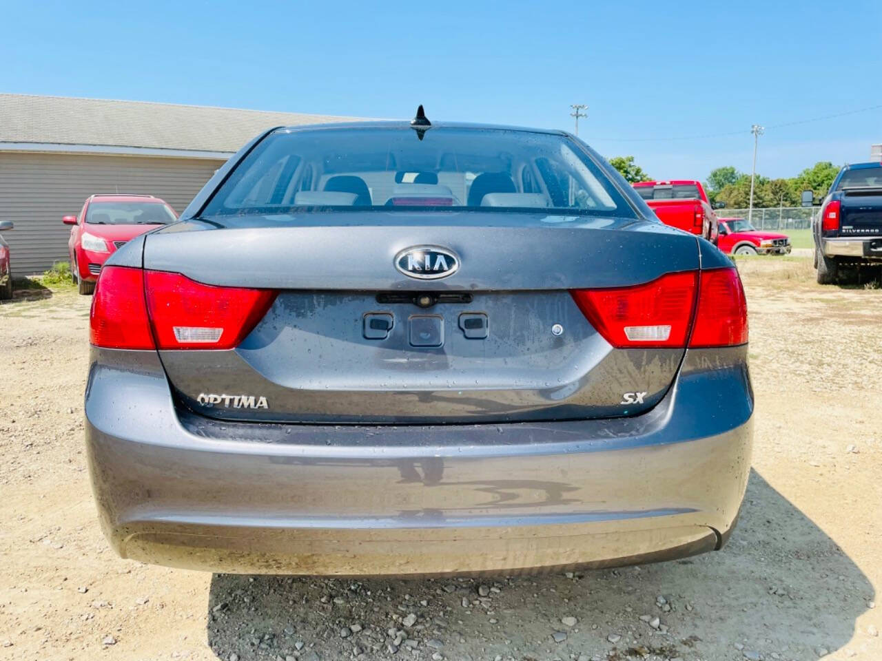 2009 Kia Optima for sale at Top Gear Auto Sales LLC in Le Roy, MN