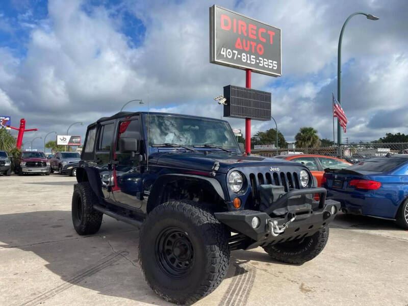 2013 Jeep Wrangler Unlimited for sale at Direct Auto in Orlando FL