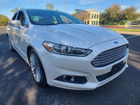 2013 Ford Fusion Hybrid for sale at AWESOME CARS LLC in Austin TX