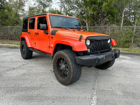 2015 Jeep Wrangler Unlimited for sale at Showtime Rides in Inverness FL