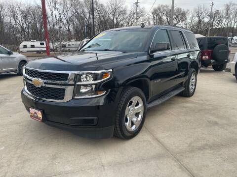 2015 Chevrolet Tahoe for sale at Azteca Auto Sales LLC in Des Moines IA