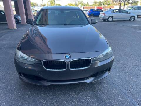 2012 BMW 3 Series for sale at AROUND THE WORLD AUTO SALES in Denver CO