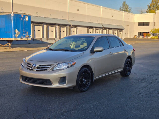 2013 Toyota Corolla for sale at Alpha Auto Sales in Auburn, WA