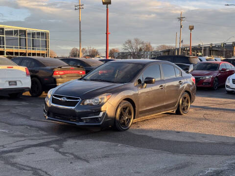 2015 Subaru Impreza for sale at El Chapin Auto Sales, LLC. in Omaha NE