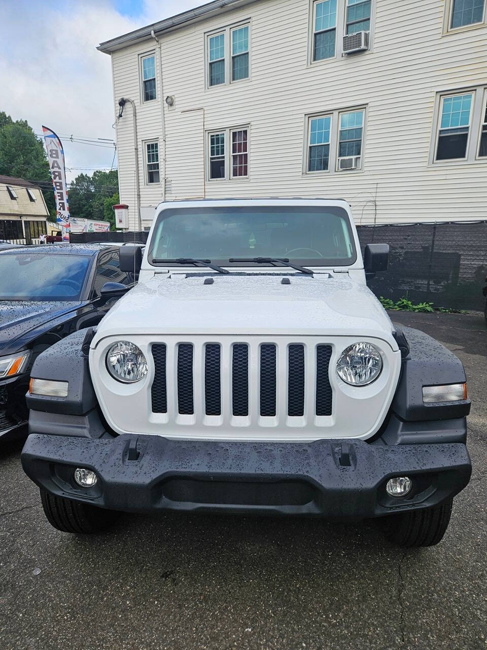 2020 Jeep Wrangler for sale at RENOS AUTO SALES LLC in Waterbury, CT