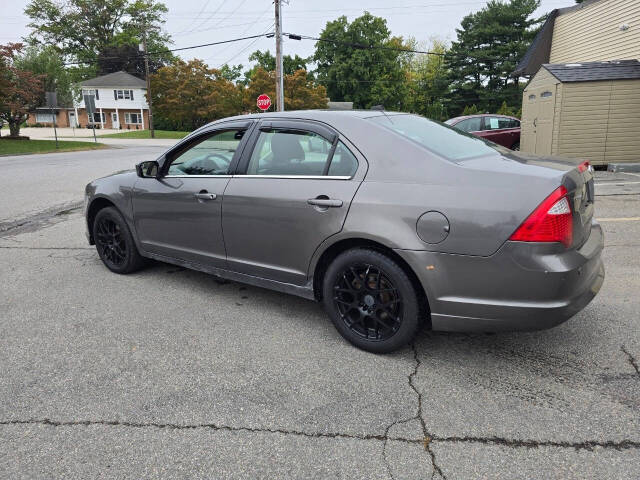 2011 Ford Fusion for sale at QUEENSGATE AUTO SALES in York, PA