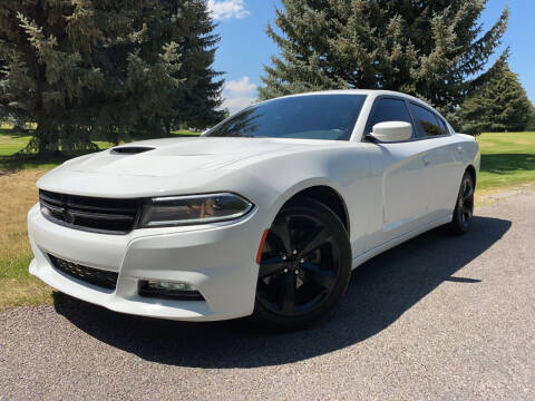 2014 Dodge Charger for sale at BELOW BOOK AUTO SALES in Idaho Falls ID
