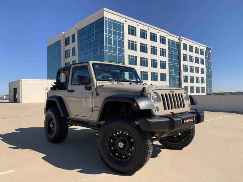 2016 Jeep Wrangler for sale at Signature Autos in Austin TX