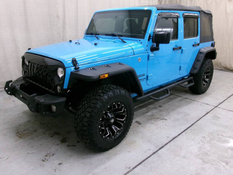 2017 Jeep Wrangler Unlimited for sale at Paquet Auto Sales in Madison OH