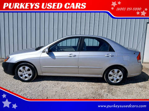 2009 Kia Spectra for sale at PURKEYS USED CARS in Coffeyville KS