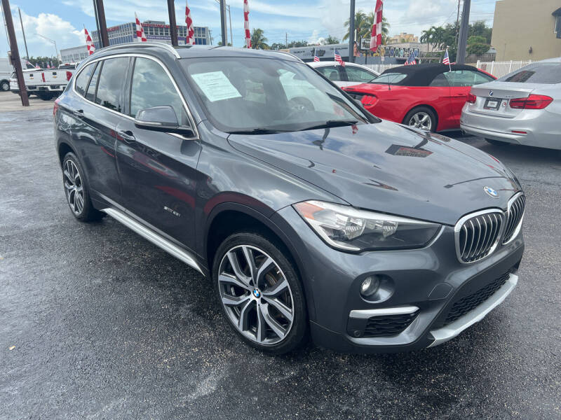 2017 BMW X1 for sale at MACHADO AUTO SALES in Miami FL