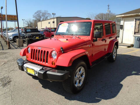 2013 Jeep Wrangler Unlimited for sale at Campos Trucks & SUVs, Inc. in Houston TX