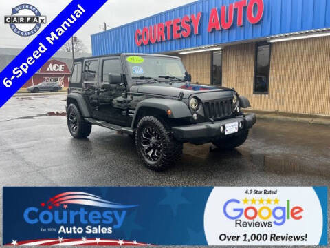 2014 Jeep Wrangler Unlimited for sale at Courtesy Auto Sales in Chesapeake VA