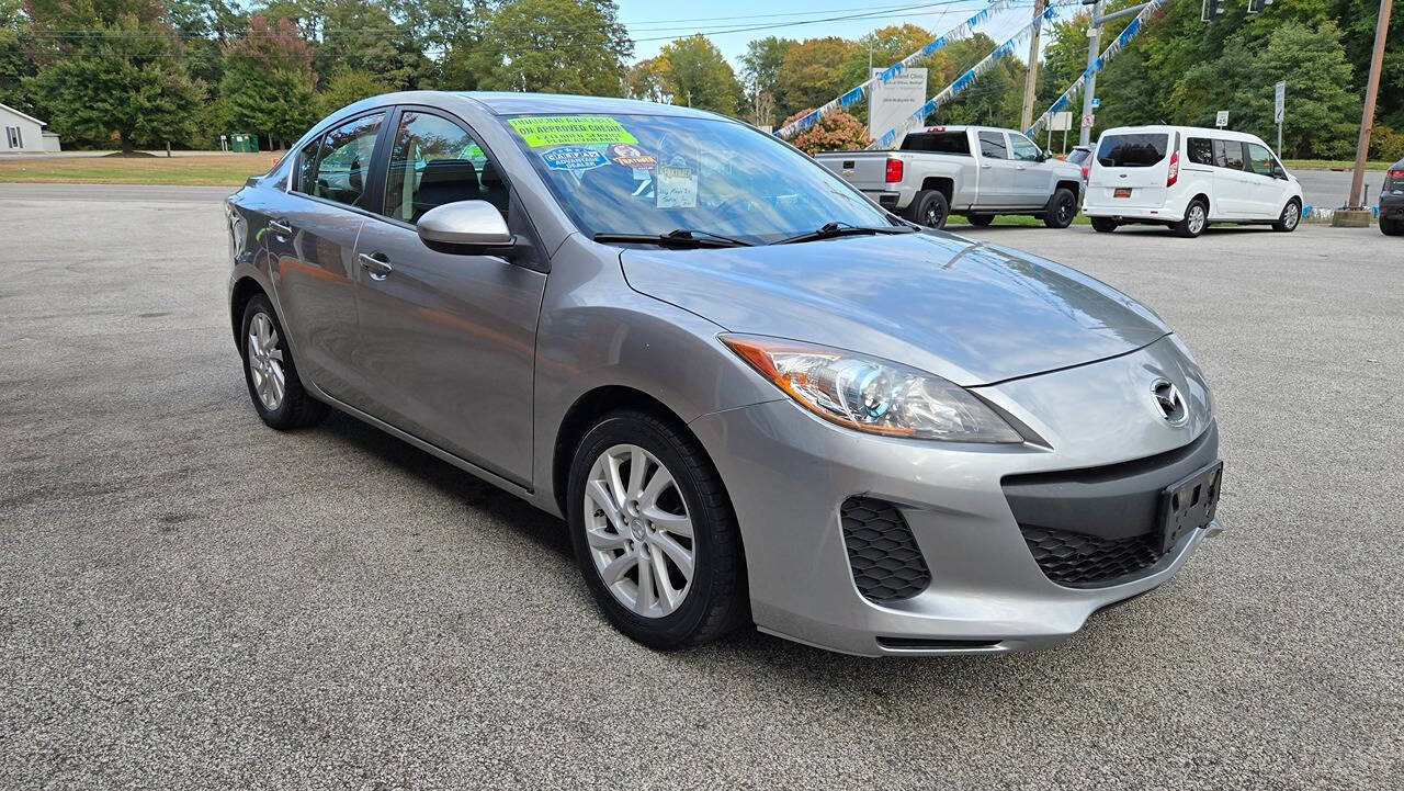 2012 Mazda Mazda3 for sale at North Ridge Auto Center LLC in Madison, OH