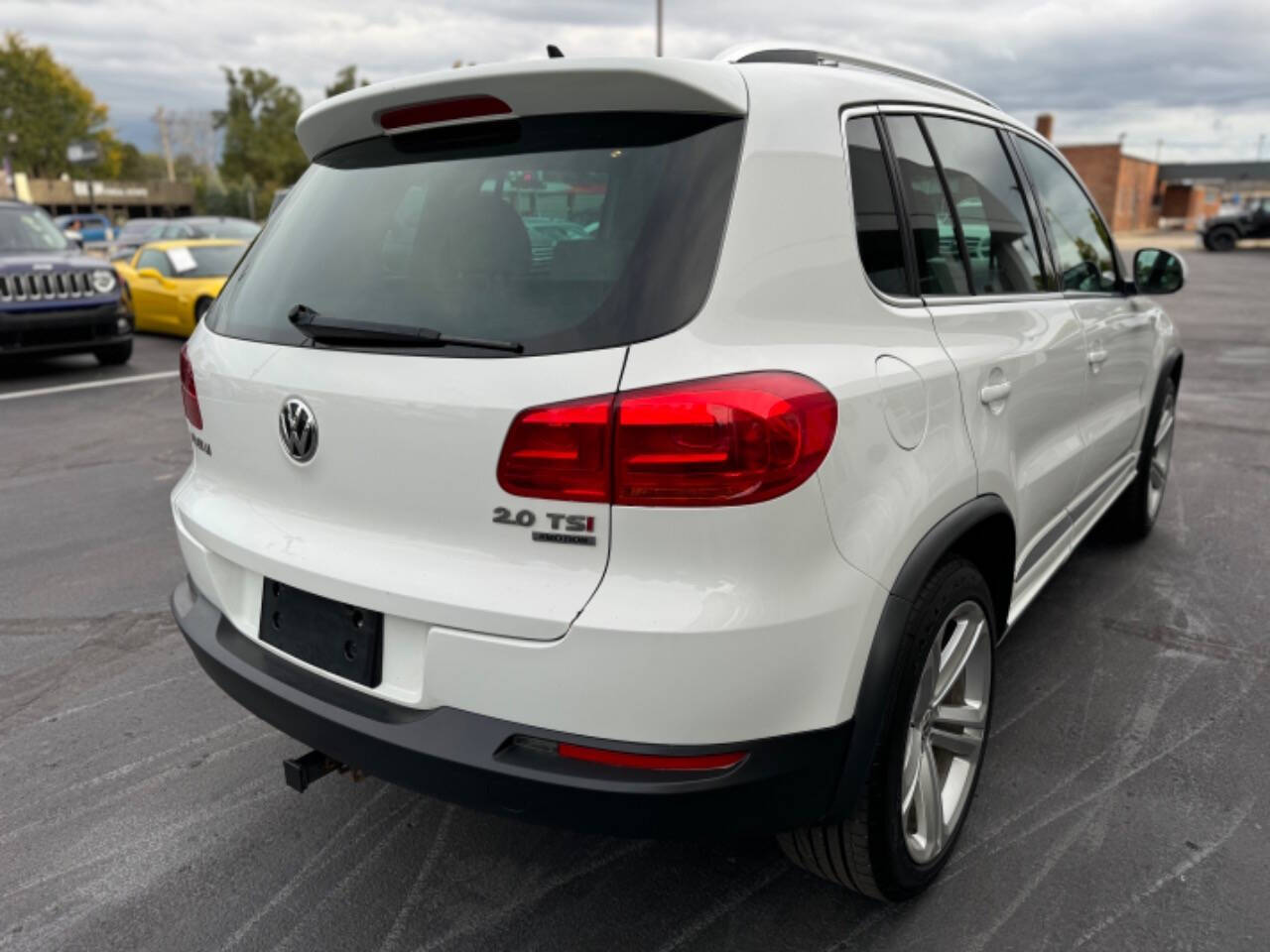 2014 Volkswagen Tiguan for sale at Opus Motorcars in Utica, MI