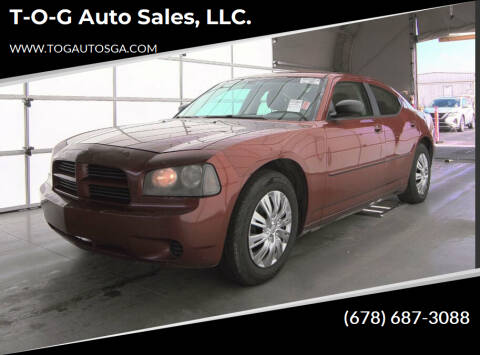 2009 Dodge Charger for sale at T-O-G Auto Sales, LLC. in Jonesboro GA