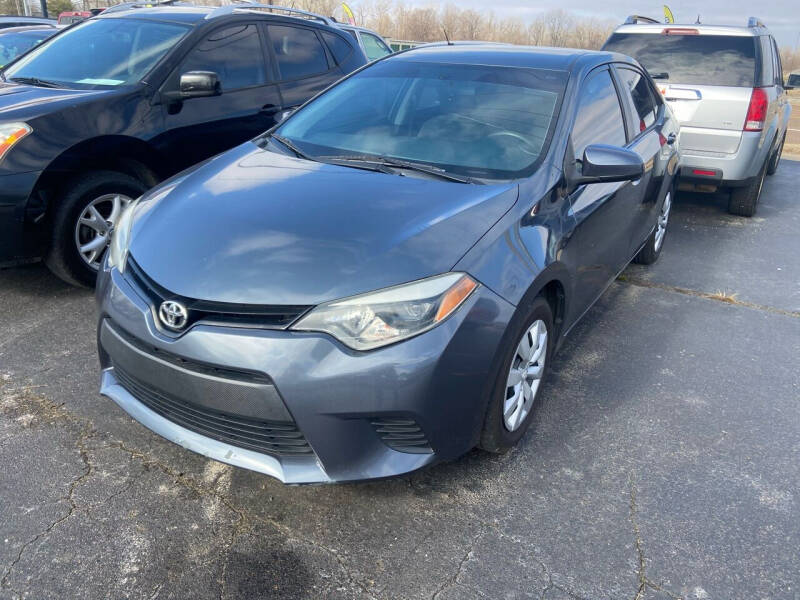 2014 Toyota Corolla for sale at Sartins Auto Sales in Dyersburg TN