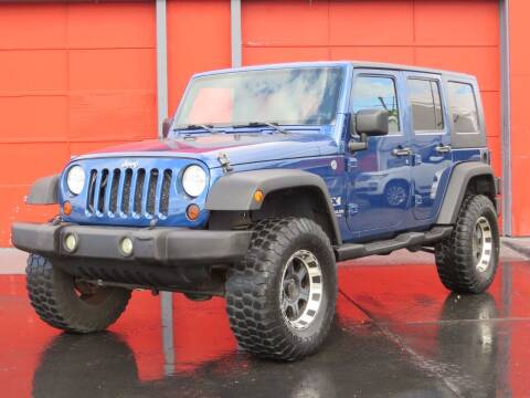 2009 Jeep Wrangler Unlimited for sale at DK Auto Sales in Hollywood FL