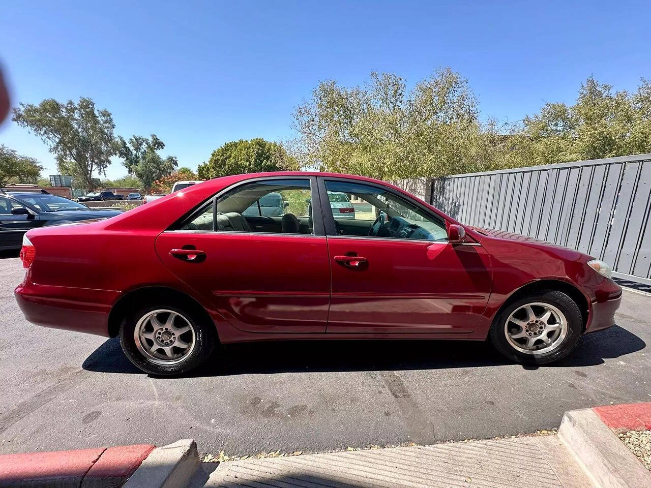 2005 Toyota Camry for sale at HUDSONS AUTOS in Gilbert, AZ