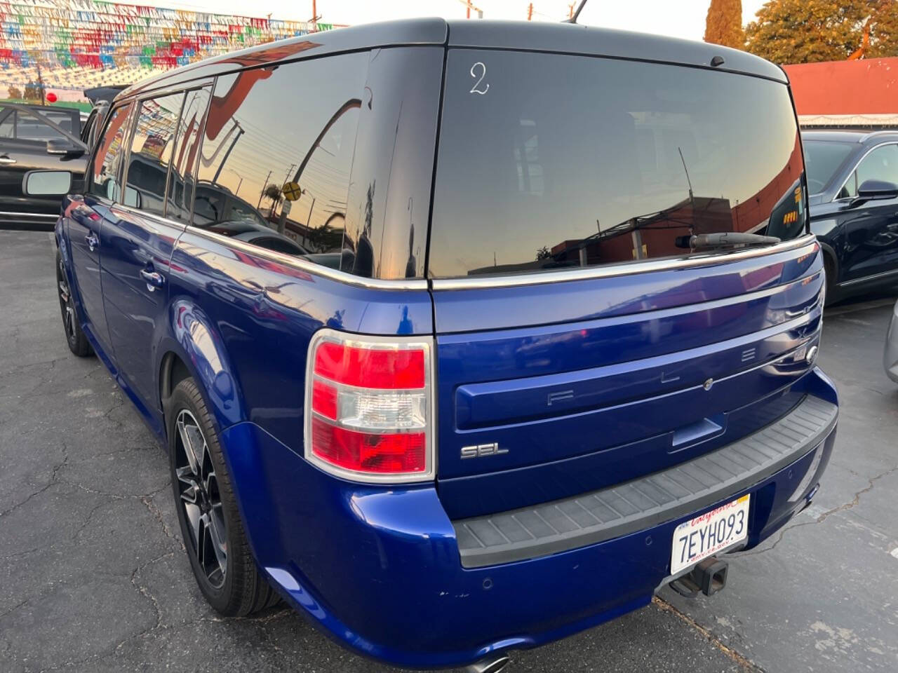 2014 Ford Flex for sale at Unique Auto Sales, Inc. in Bell, CA