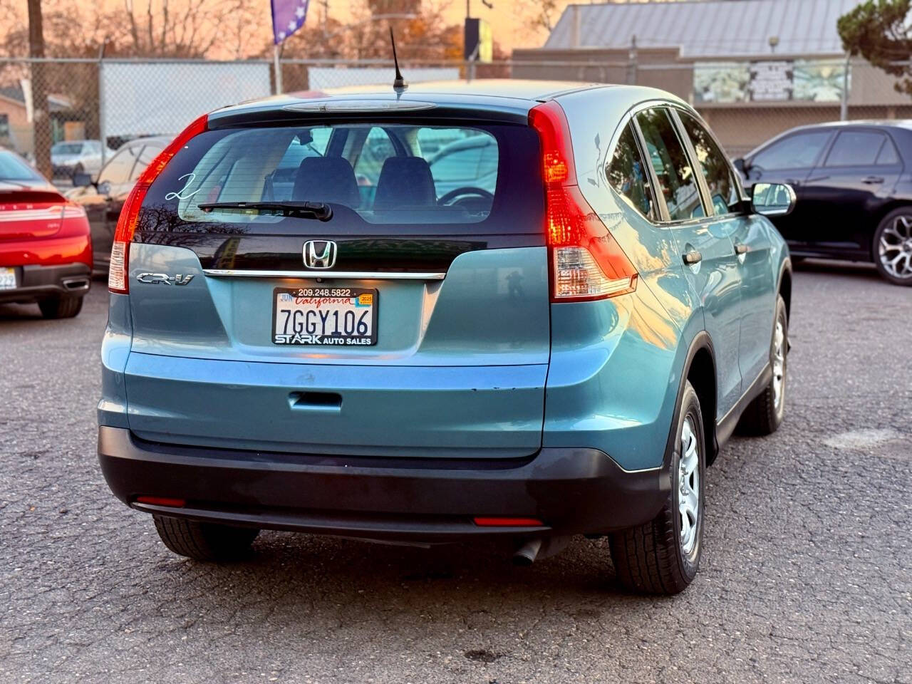 2014 Honda CR-V for sale at STARK AUTO SALES INC in Modesto, CA