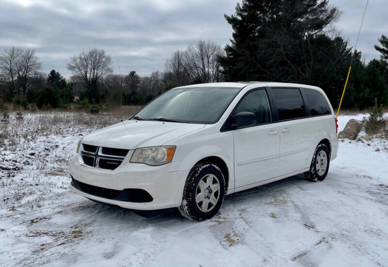 2011 Dodge Grand Caravan for sale at Hammer Auto LLC in Stanwood MI