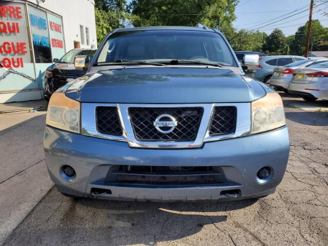 2010 Nissan Armada for sale at DAGO'S AUTO SALES LLC in Dalton, GA