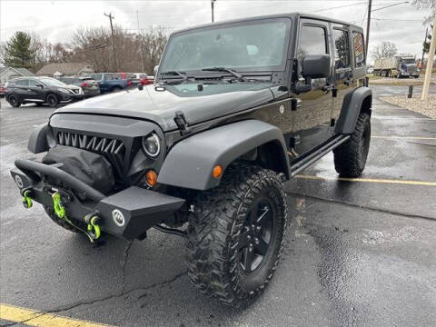 2016 Jeep Wrangler Unlimited for sale at HUFF AUTO GROUP in Jackson MI