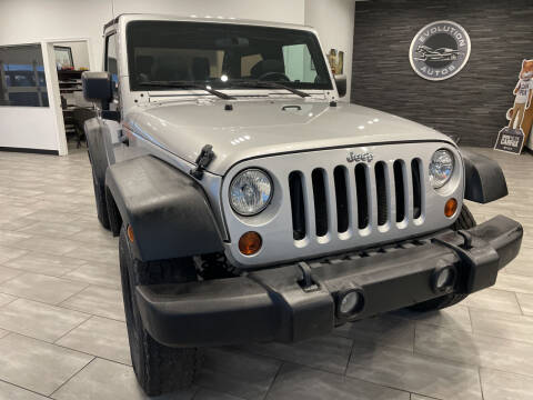 2011 Jeep Wrangler for sale at Evolution Autos in Whiteland IN
