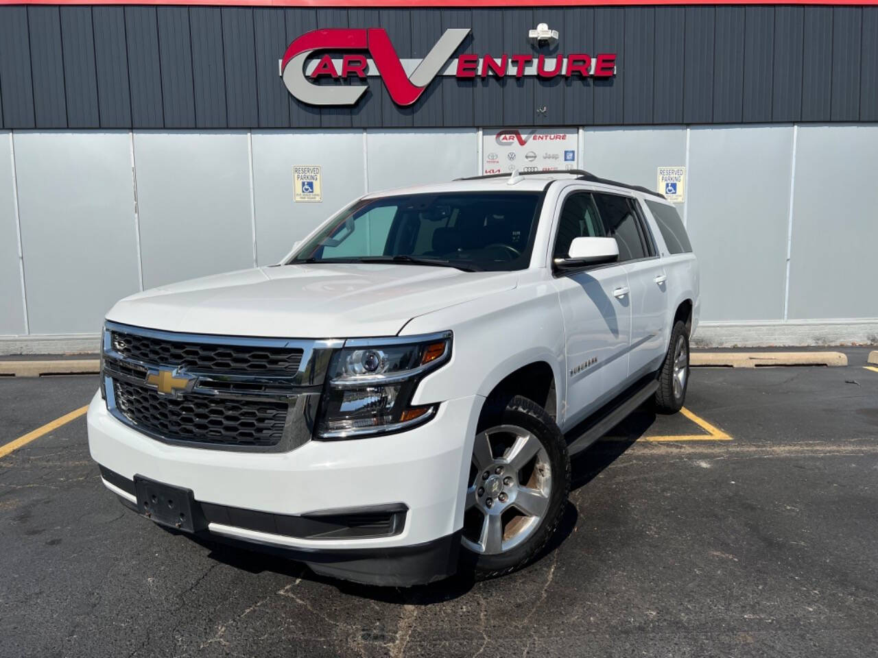 2015 Chevrolet Suburban for sale at Carventure in Lansing, MI