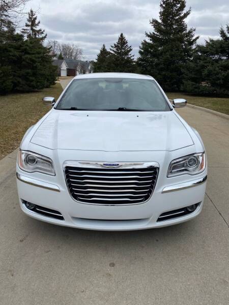 2013 Chrysler 300 for sale at Roman's Auto Sales in Warren MI