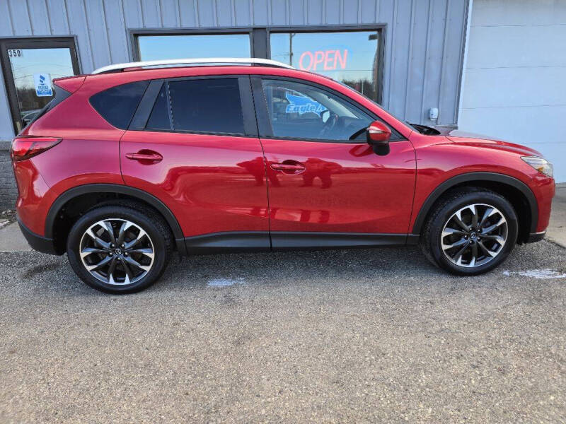 Used 2016 Mazda CX-5 Grand Touring with VIN JM3KE4DY4G0805552 for sale in La Crescent, Minnesota